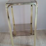 Golden side table and smoked glass
