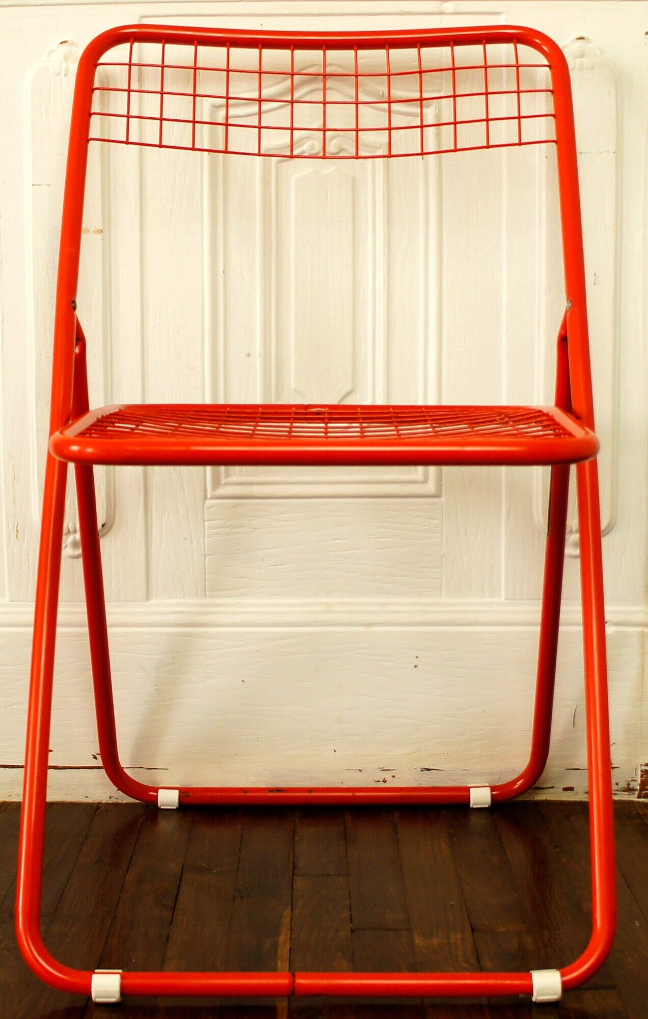 Red "grid" metal folding chair 1980