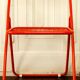 Red "grid" metal folding chair 1980