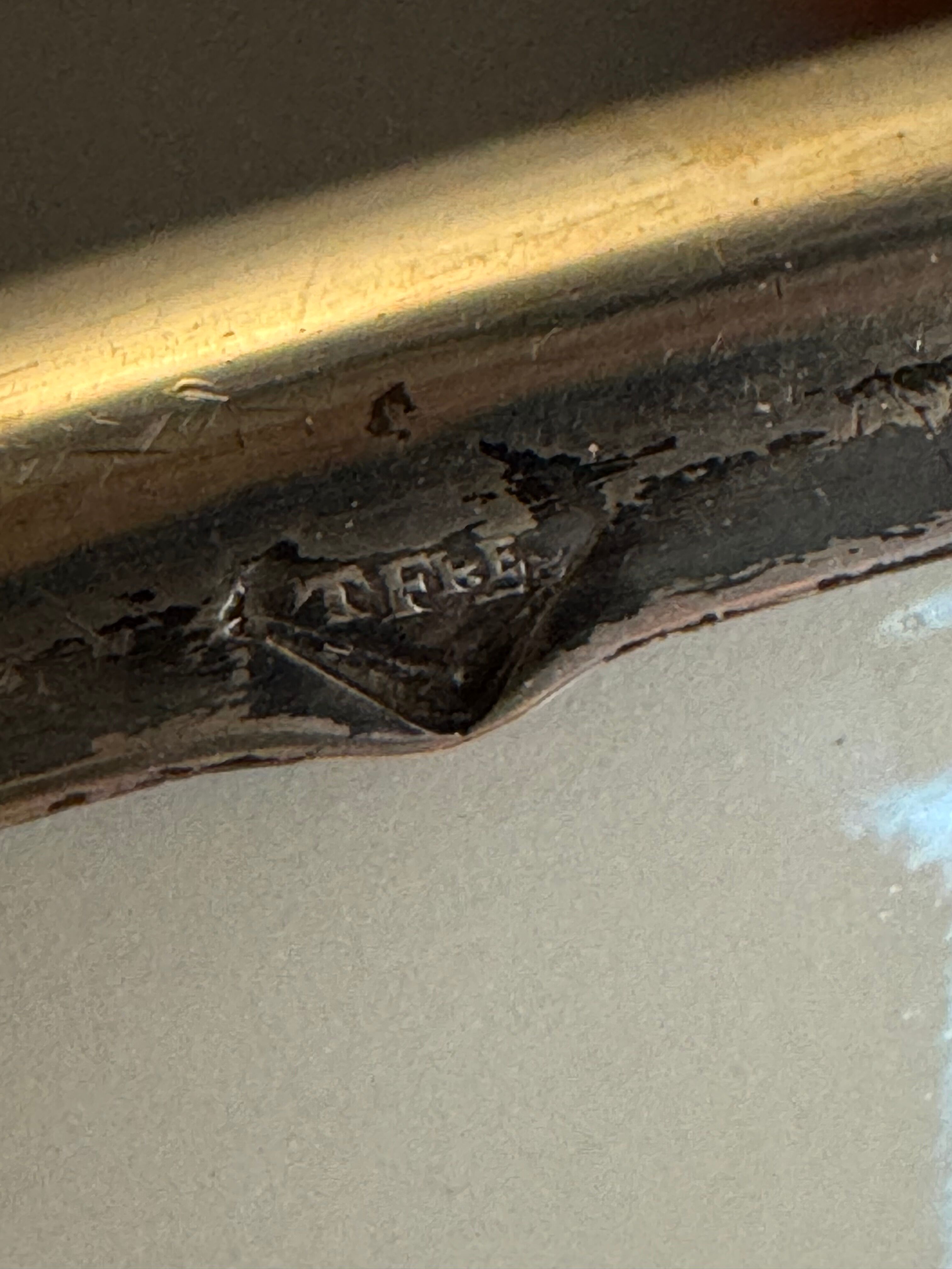 Two Raynaud Limoges plates and Tetard brothers silver.