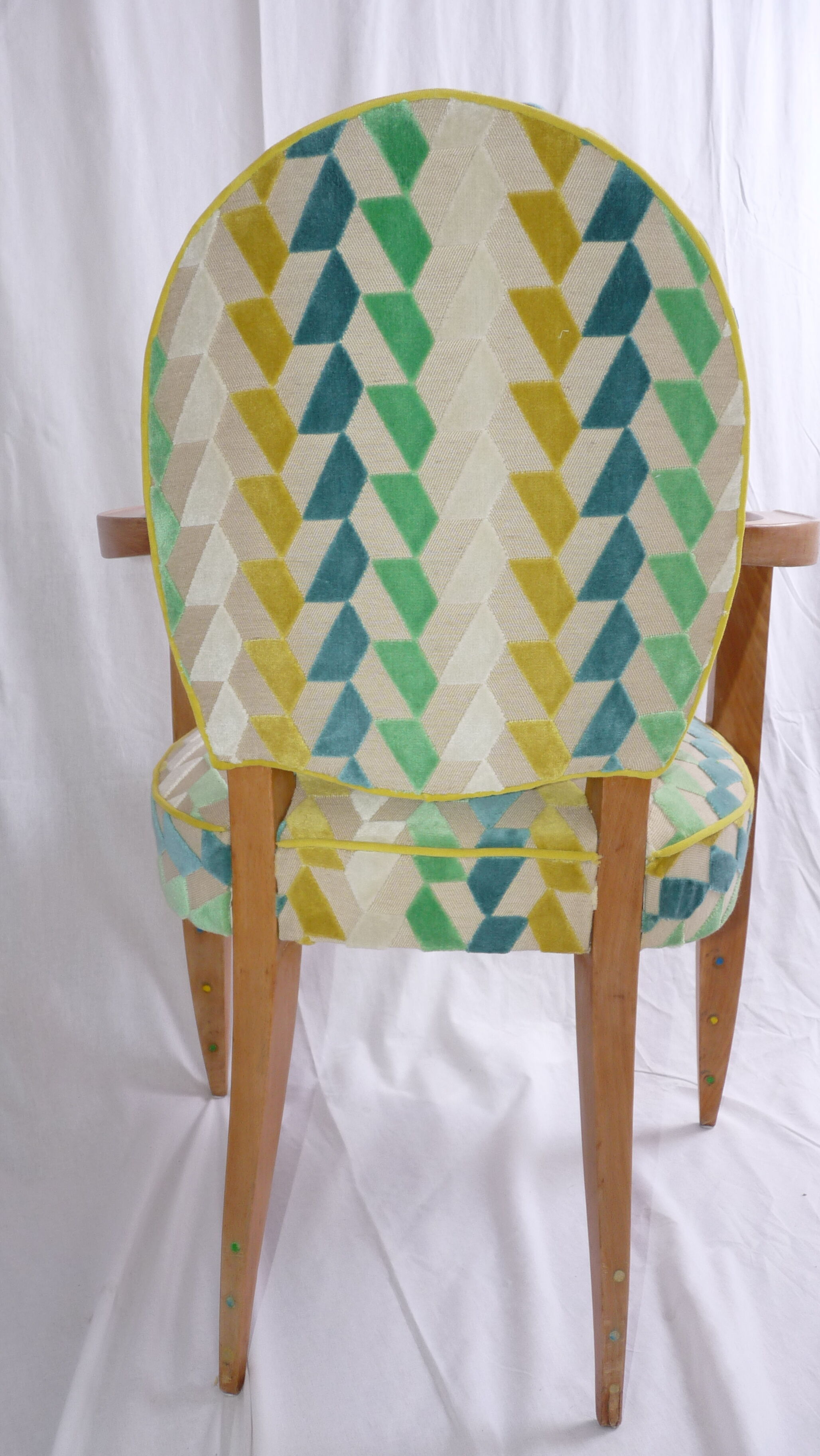Office chair made of beech and green fabric