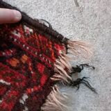 Ancien tapis en laine fait main