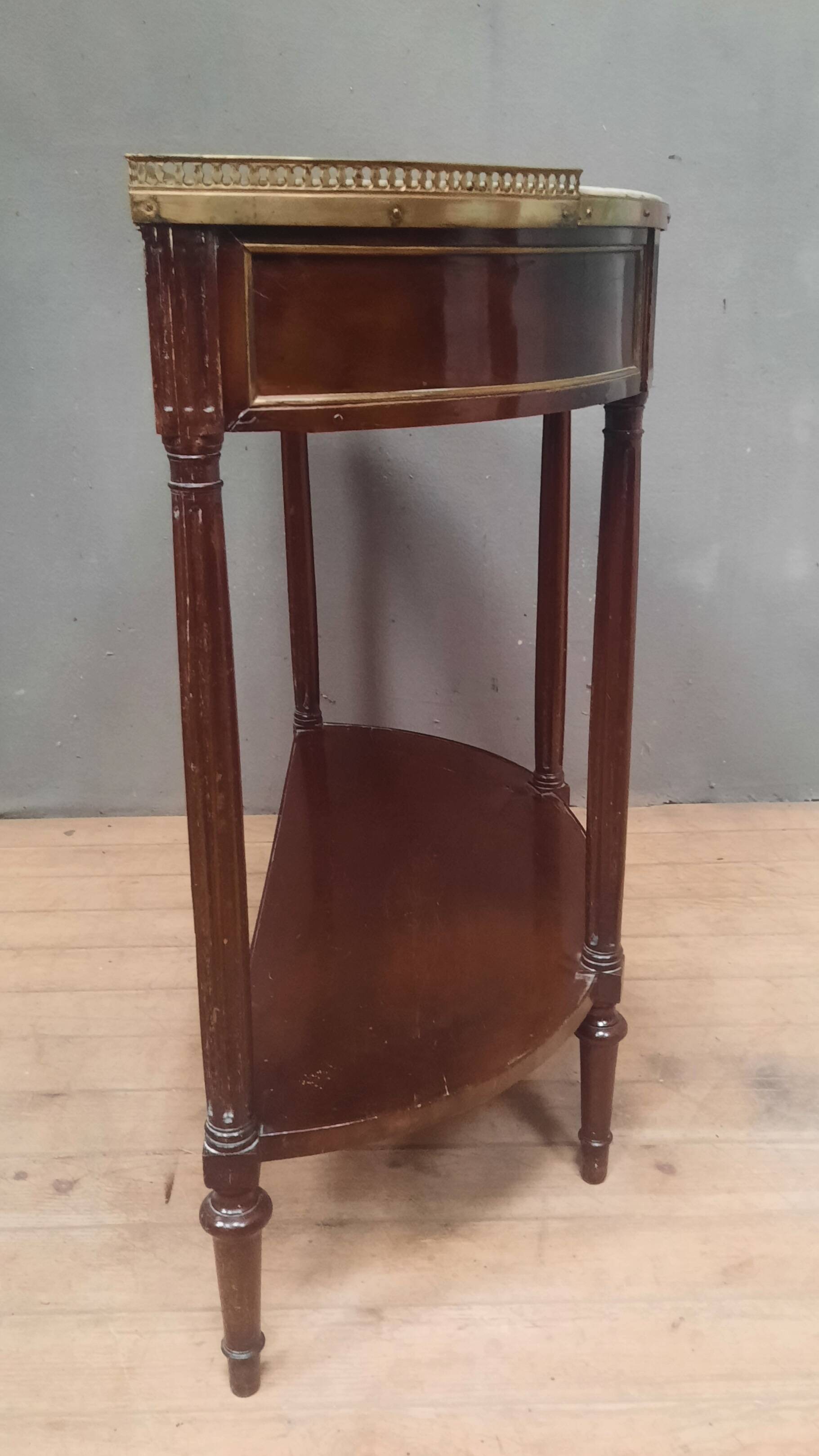 Louis XVI period demi-lune console in mahogany.