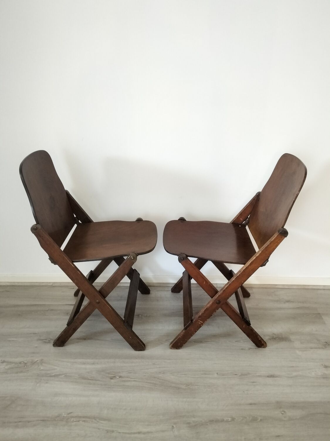 Folding chairs in US armed wood