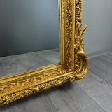 Grand miroir style Louis XV en bois sculpté et doré, XIXe siècle