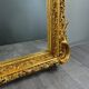 Large Louis XV style mirror in carved and gilded wood, 19th century