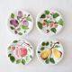 4 vintage plates in slurry fruit decoration