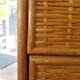 Storage column, wooden bookshelf and woven rattan.