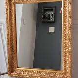 Miroir doré en bois et stuc ancien 24x30cm