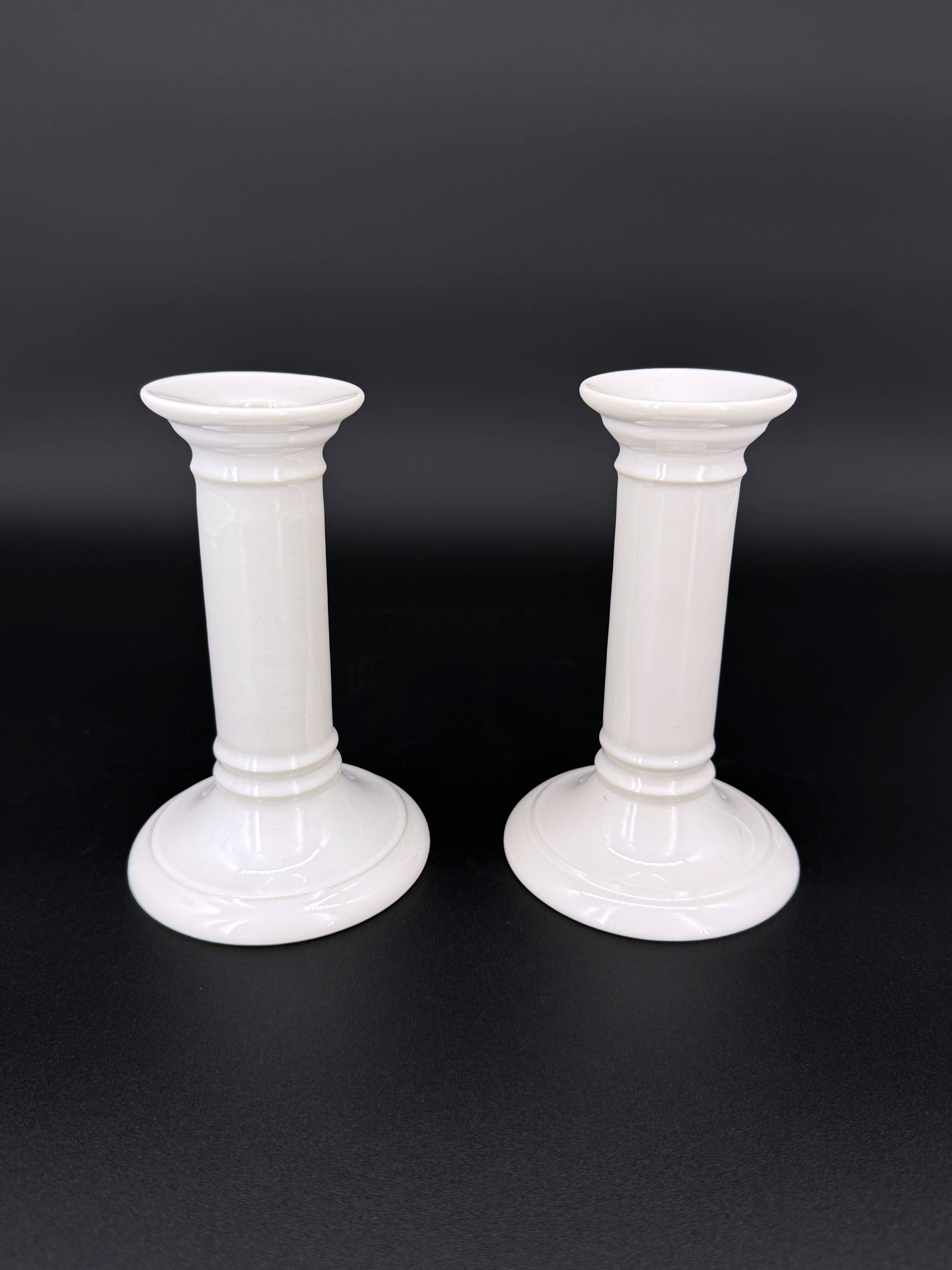 Pair of white earthenware candlesticks – Doulton, England, early 20th century