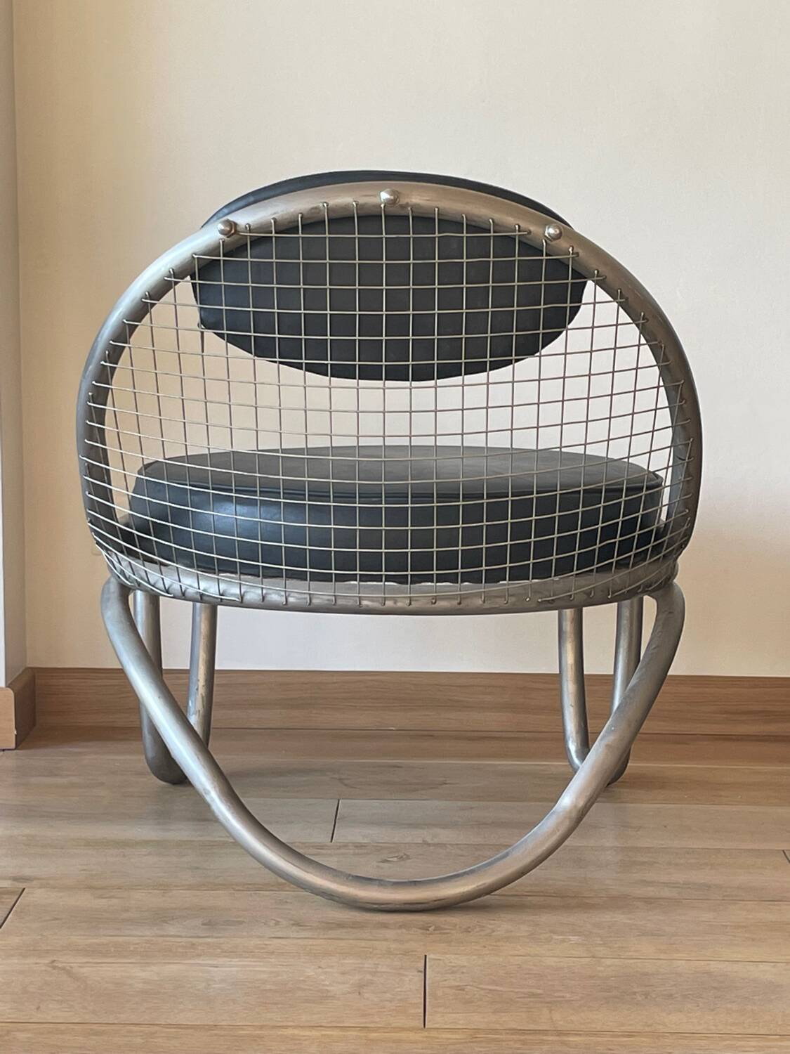 Metal and leather armchairs