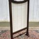 Walnut fireplace screen from the early 20th century