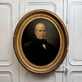 Oil on canvas portrait of a man, late 19th century, oval frame gilded with gold leaf.