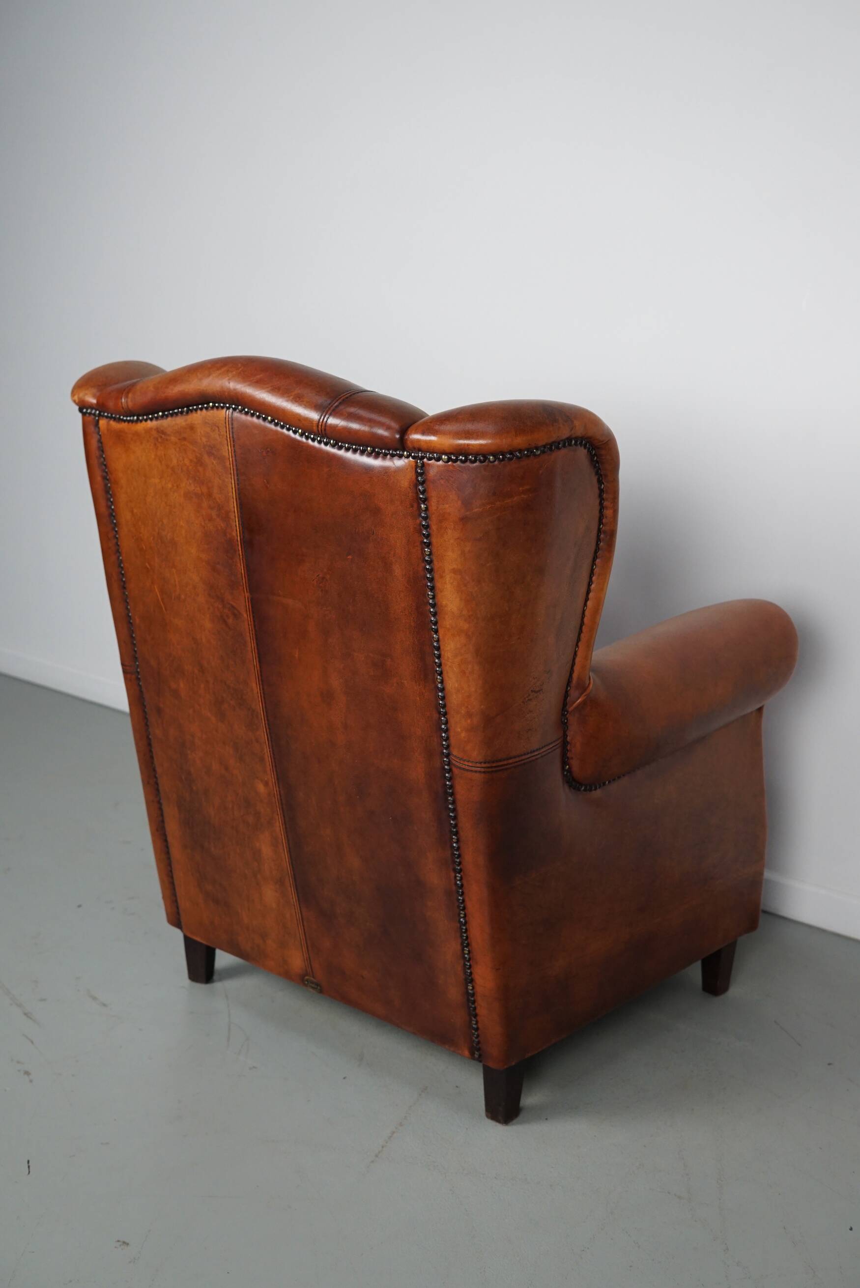 Fauteuil club vintage en cuir couleur cognac hollandais