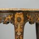 Baroque-style table in carved wood