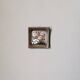 Handcrafted ceramic wall hanging with floral daisy decoration