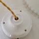 Serrated opaline suspension