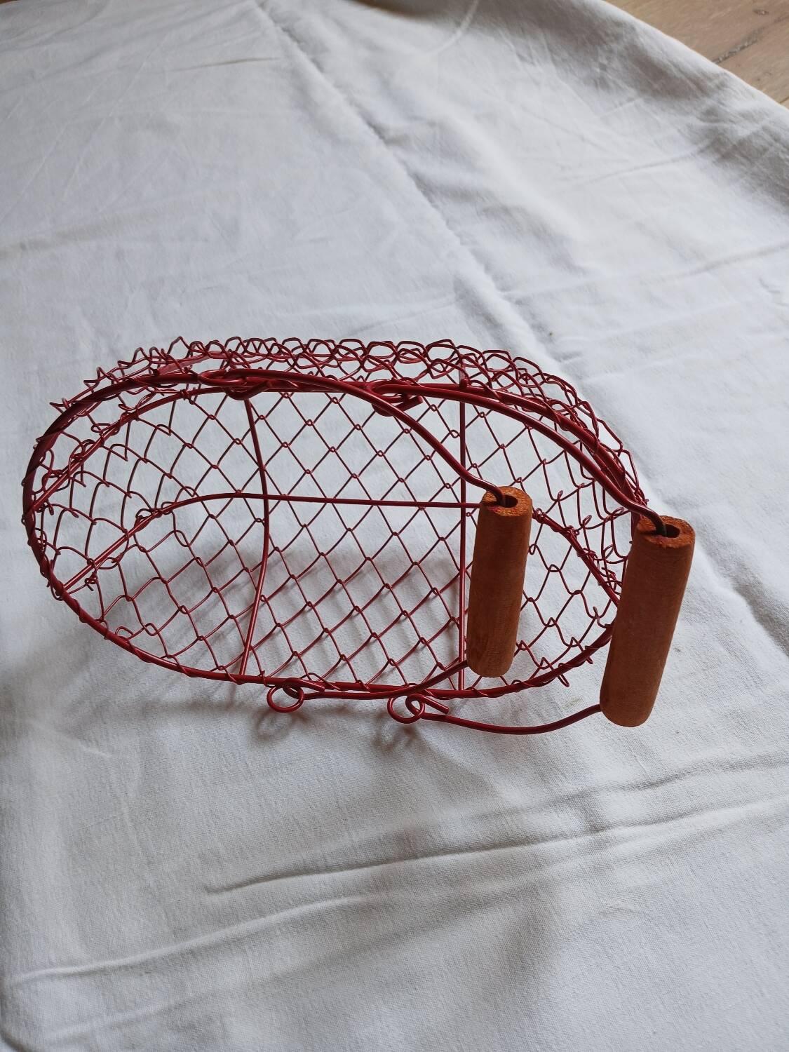 Small red metal basket