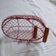 Small red metal basket