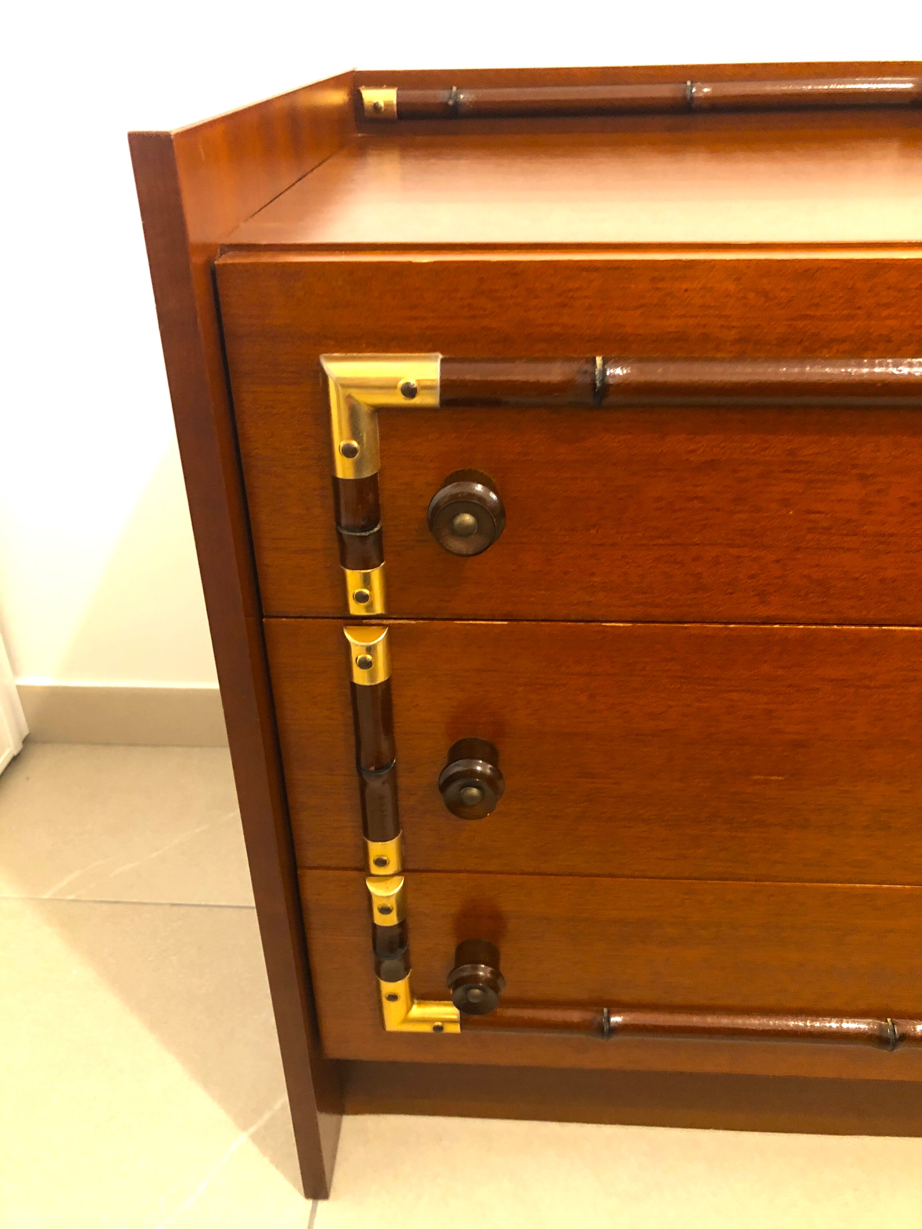 Vintage wooden and gilded chest of drawers colonial style