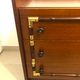Vintage wooden and gilded chest of drawers colonial style