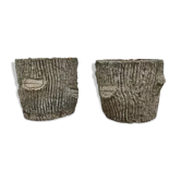 Two cement planters imitation tree trunks