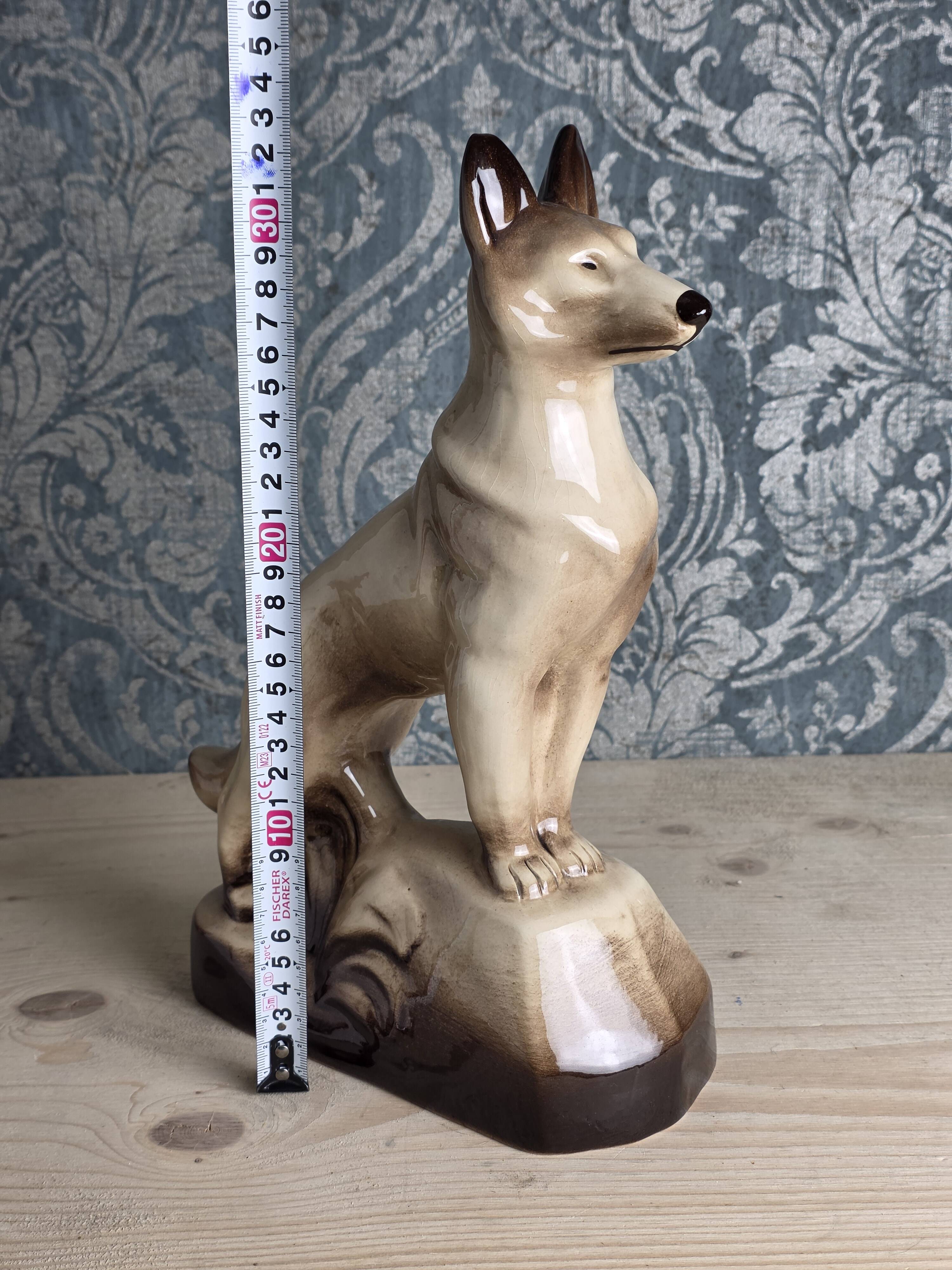 Porcelain shepherd dog, large decorative sculpture.