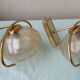 Pair of brass and glass wall lights