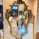 Louis XV style wood and gilded stucco mirror