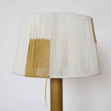 Wooden candle holder mounted as a lamp and its rope shade, 47.5cm.