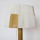 Wooden candle holder mounted as a lamp and its rope shade, 47.5cm.