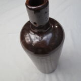 Bouteille ancienne à alcool en grés émaillé