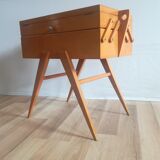 Sewing worker's feet compasses of the 60s