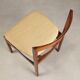 Vintage lounge chairs in exotic wood and fabric, 1960s design.