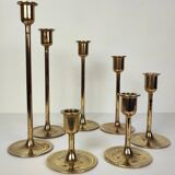 Set of 7 brass candlesticks