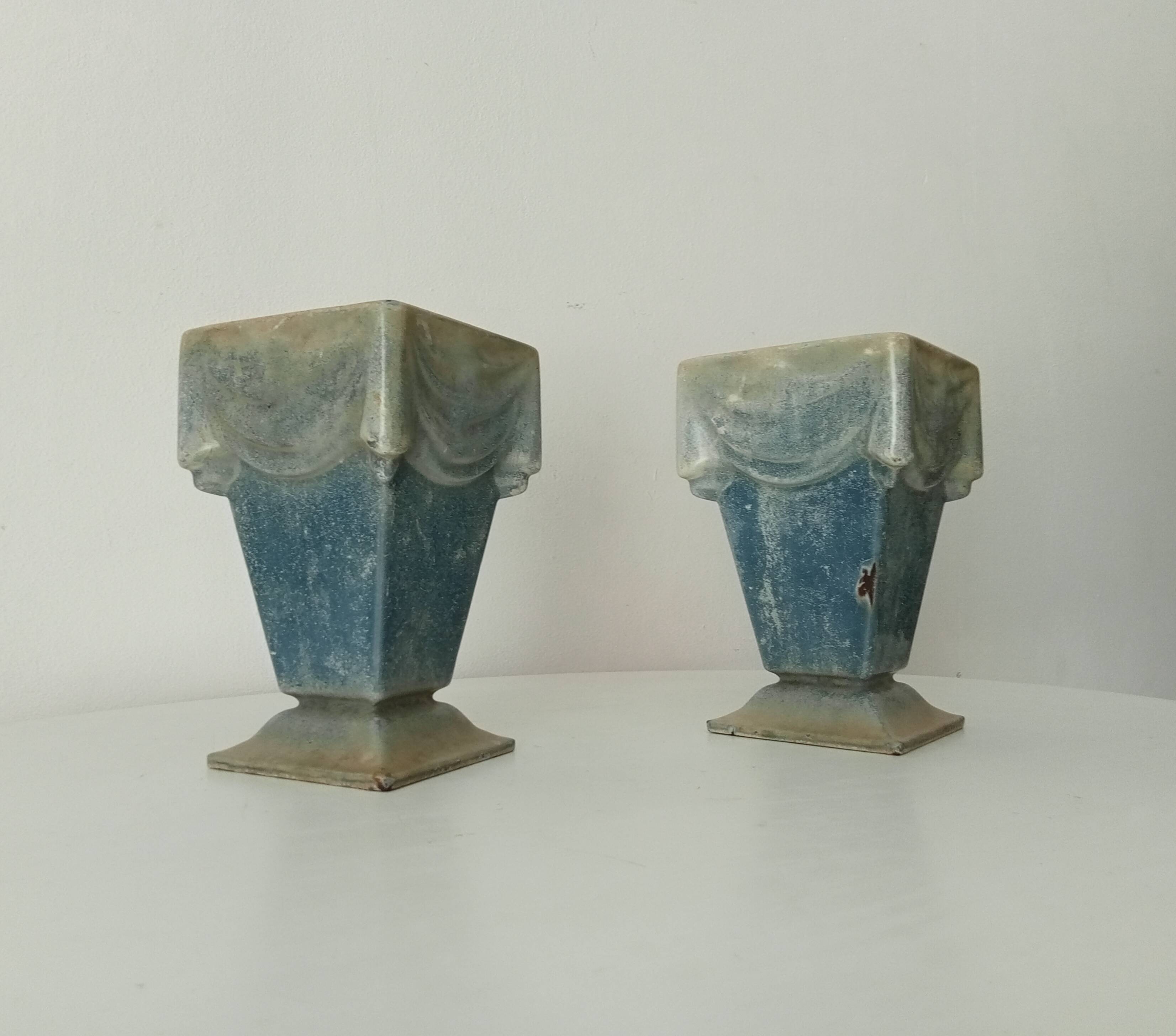 Pair of old art deco vases in enameled cast iron