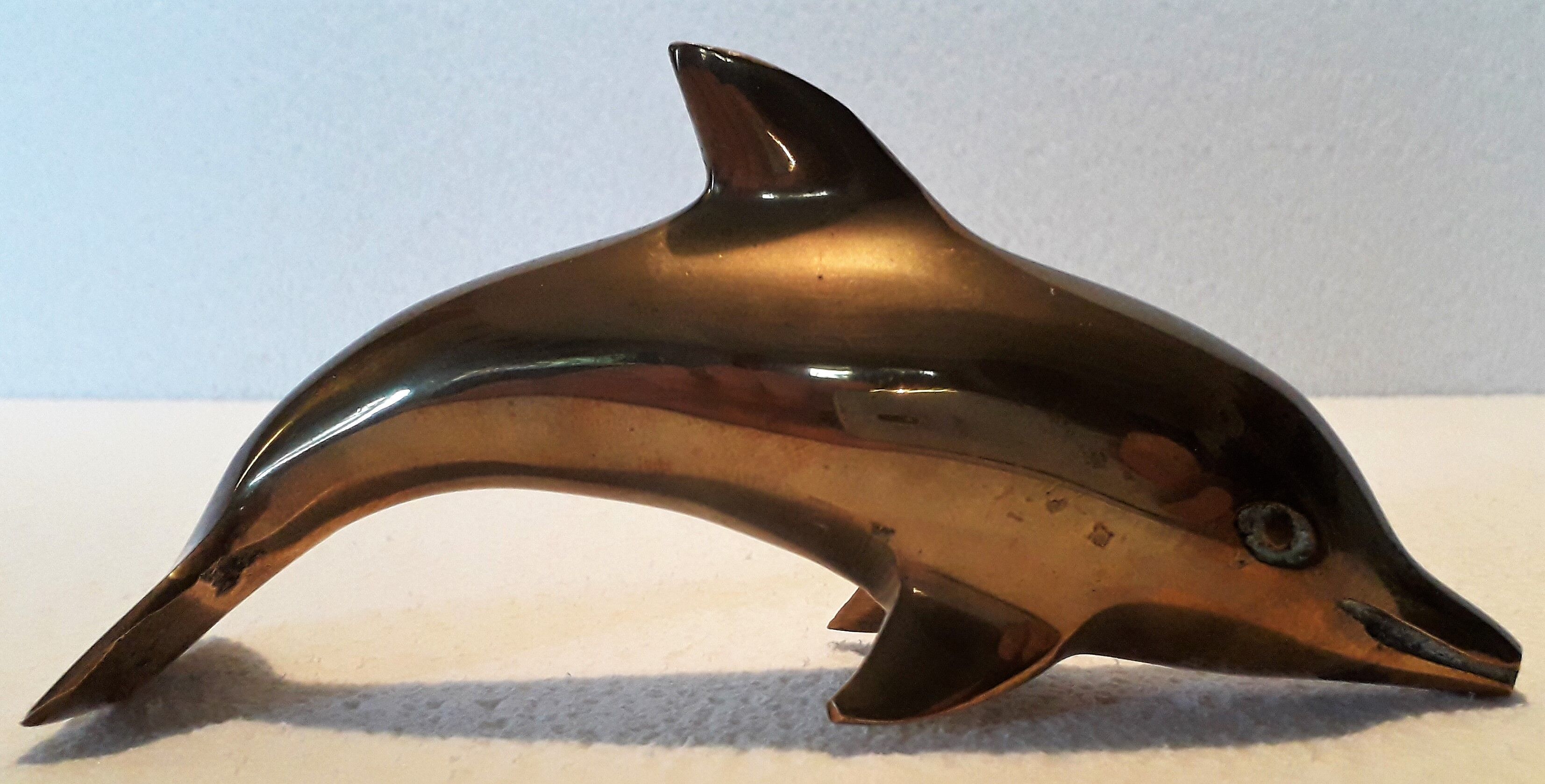 Brass dolphin