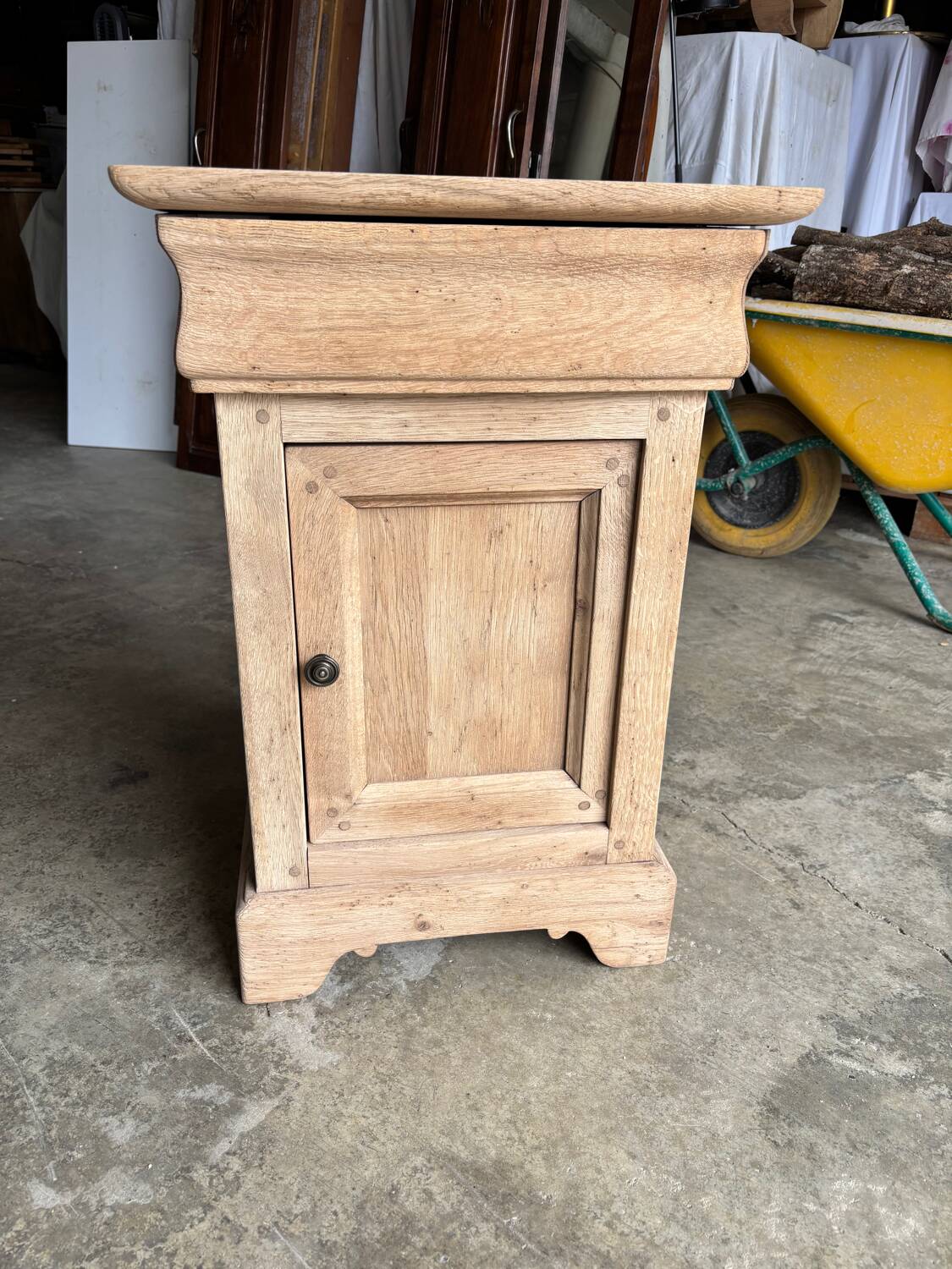 Raw wood bedside table