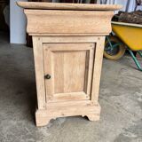 Raw wood bedside table