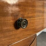English commode from the George III Regency period, bombe shape in mahogany veneer.