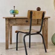 Vintage children's school chair in wood and black metal, industrial style.