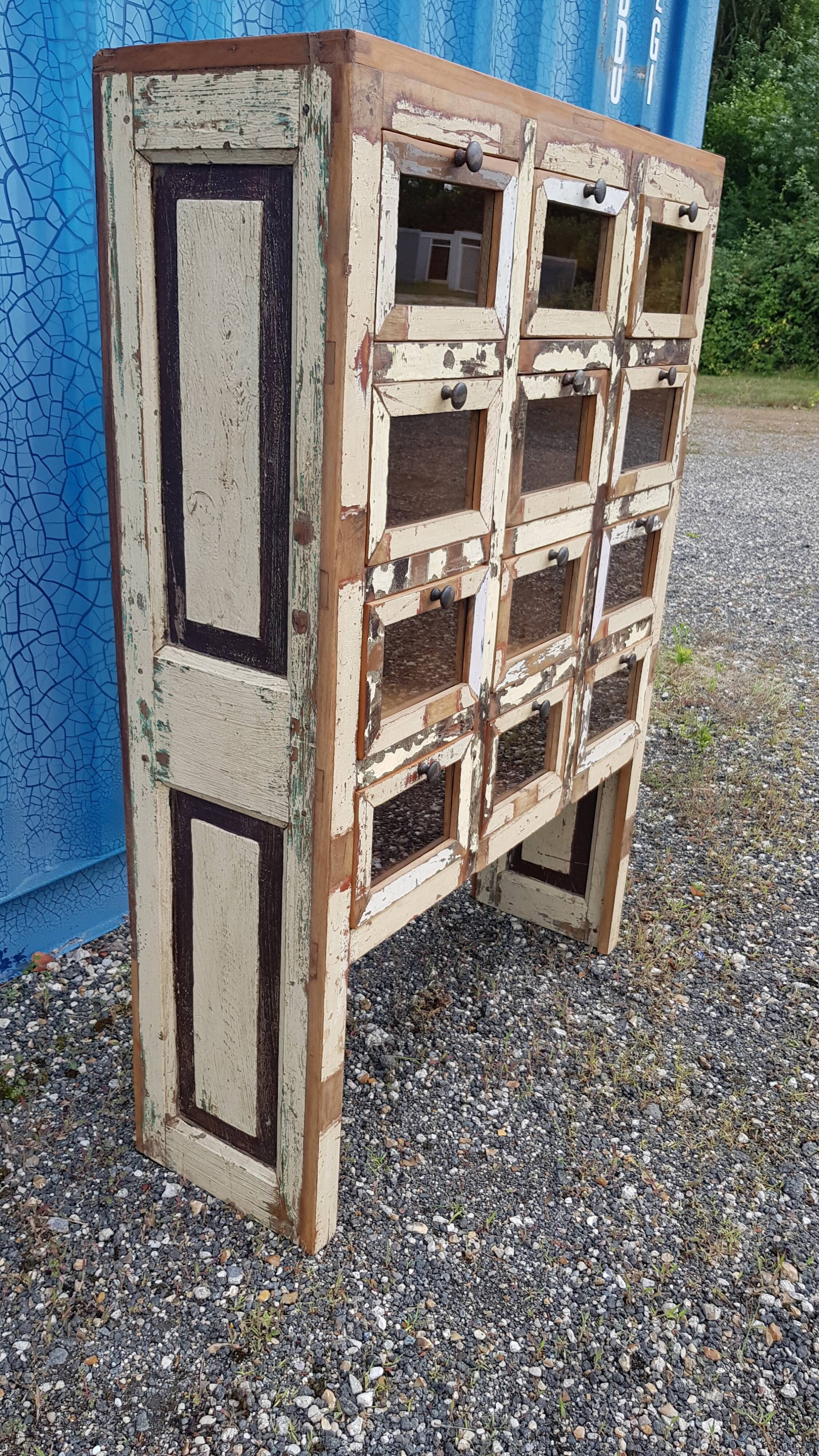 Meuble de marchand - chiffonnier 12 tiroirs en teck
