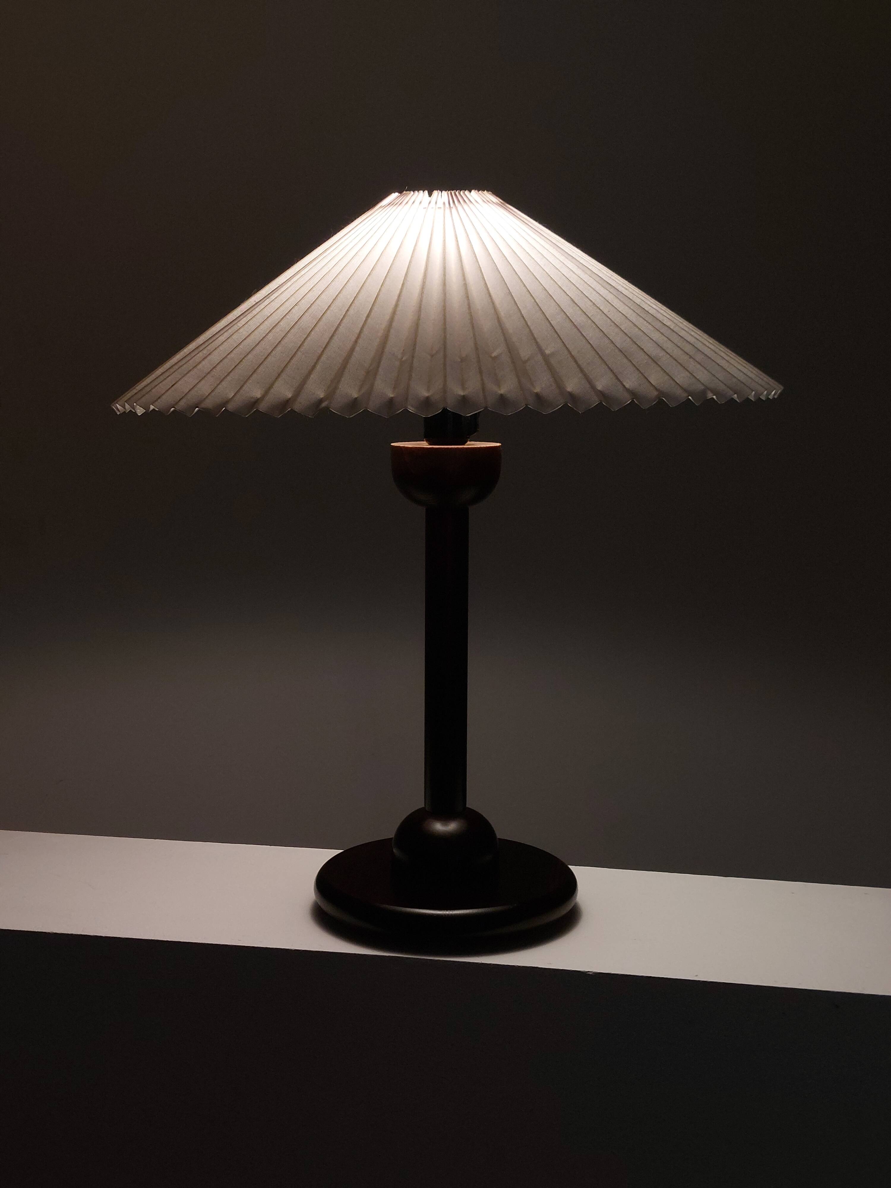 Vintage table in postmodern Art Deco revival with pleated lampshade.