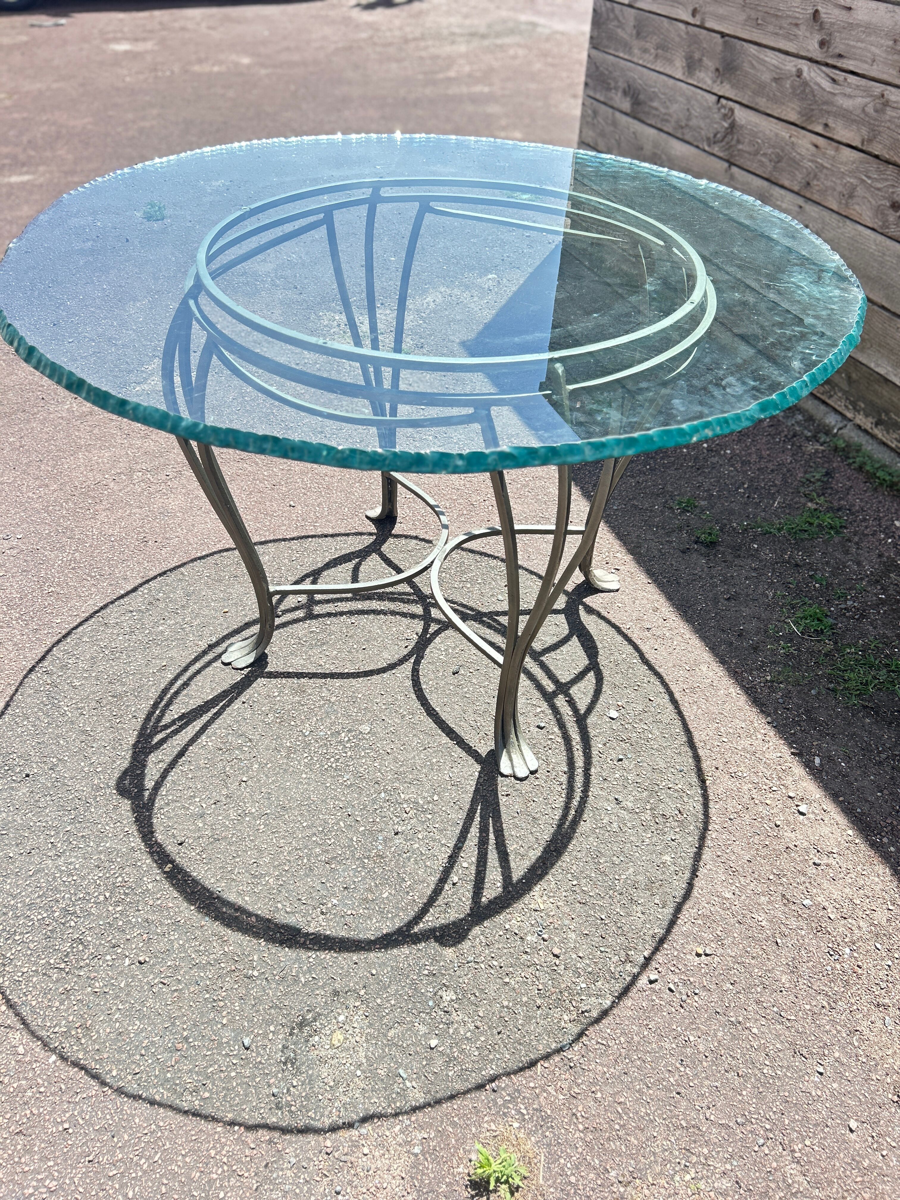 Table ronde en verre et fer forgé