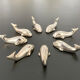 8 whale-shaped knife holders in silver metal