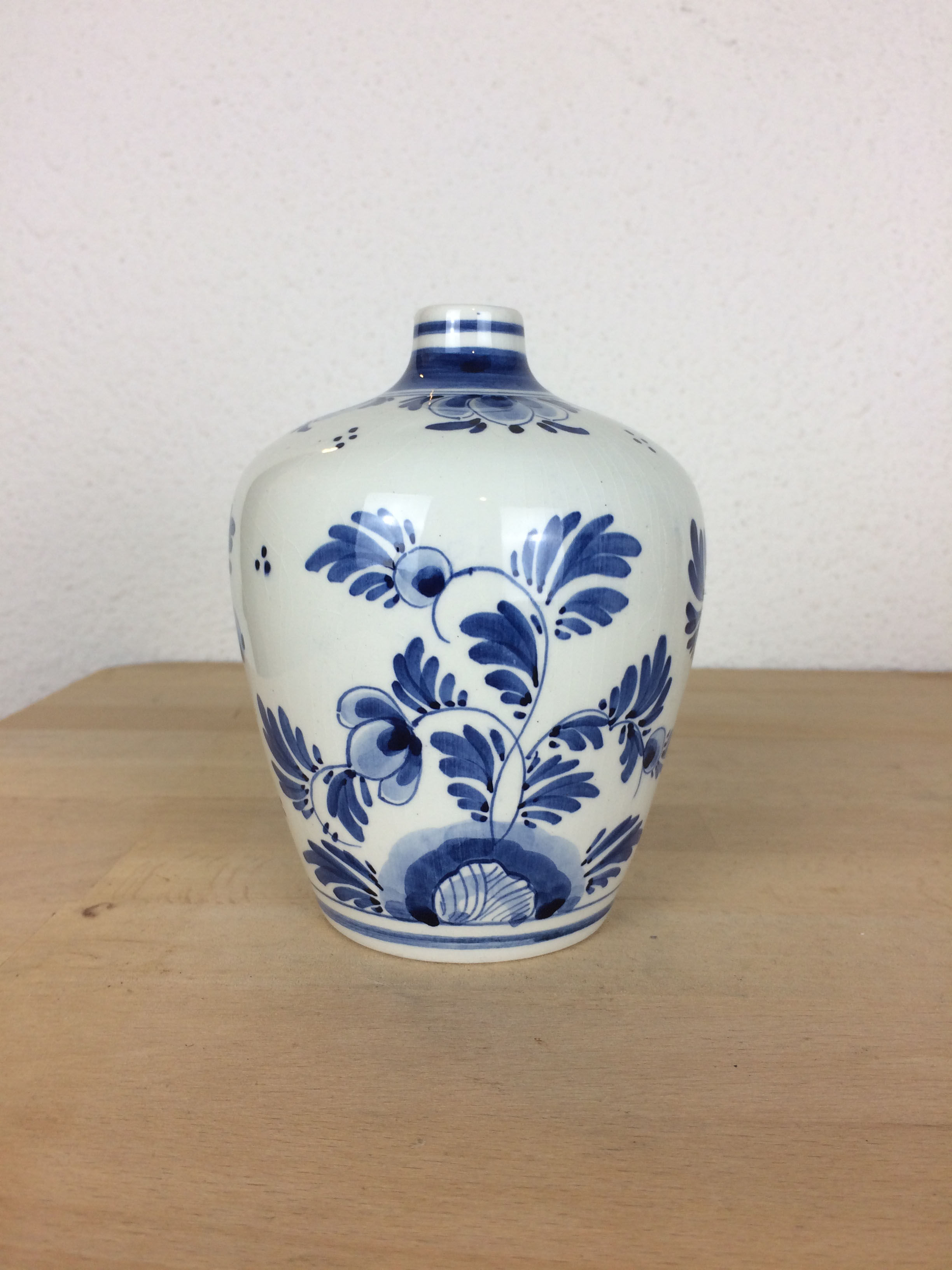Delft earthenware vase with blue flowers