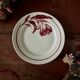 Composition de 9 assiettes plates terre de fer Badonviller et Digoin