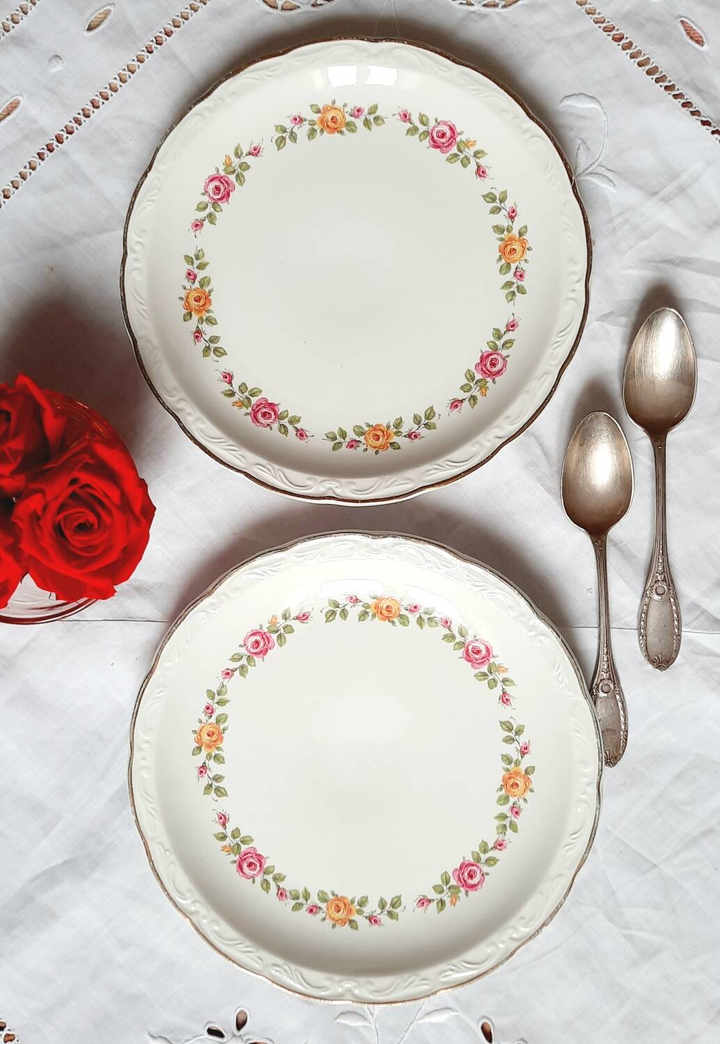 Old mismatched earthenware dessert plates with gold accompanied by a dish