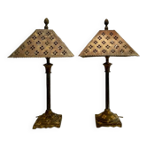 Pair of lamps in patinated gold metal
