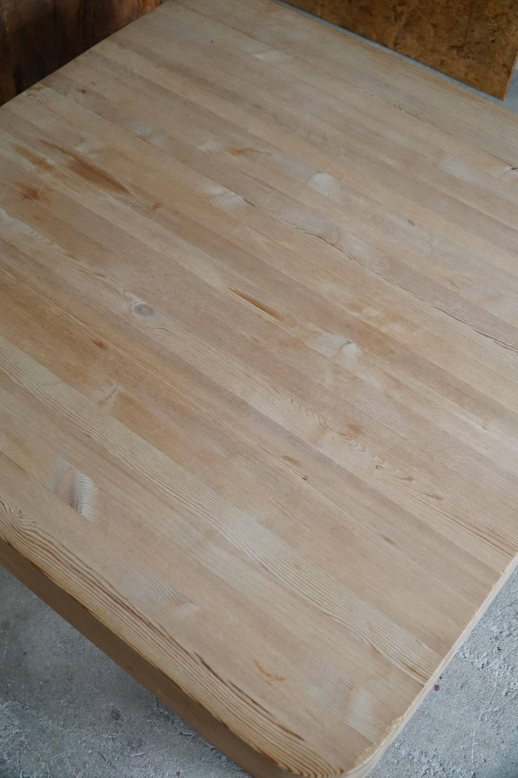 Square coffee table in solid pine with solid legs by Rainer Daumiller, mid-20th century brutalist style.